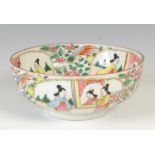 A porcelain famille rose footed bowl, the interior decorated with circular panel enclosing peony,