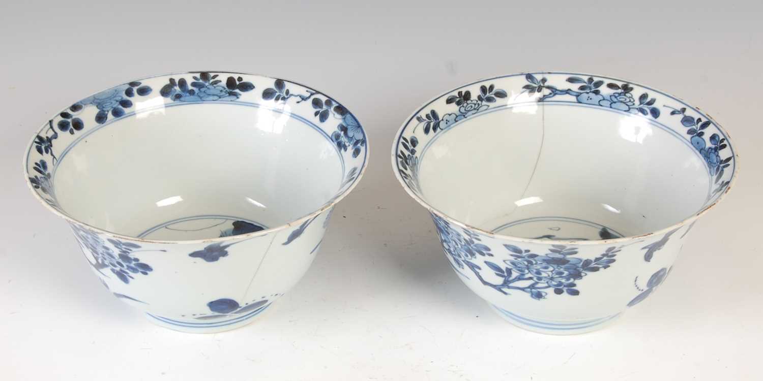 A pair of Chinese porcelain blue and white bowls, Qing Dynasty, the exteriors decorated with - Image 2 of 16