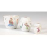 A small group of Chinese famille rose decorated porcelain, Qing Dynasty, comprising two graduated