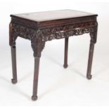 A Chinese dark wood rectangular table, Qing Dynasty, the rectangular top with mottled purple and