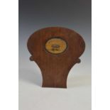 A Regency mahogany hall chair back panel section, centred with an oval painted Armorial panel for '