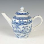 A Chinese porcelain blue and white teapot and cover, Qing Dynasty, decorated with a fenced garden of