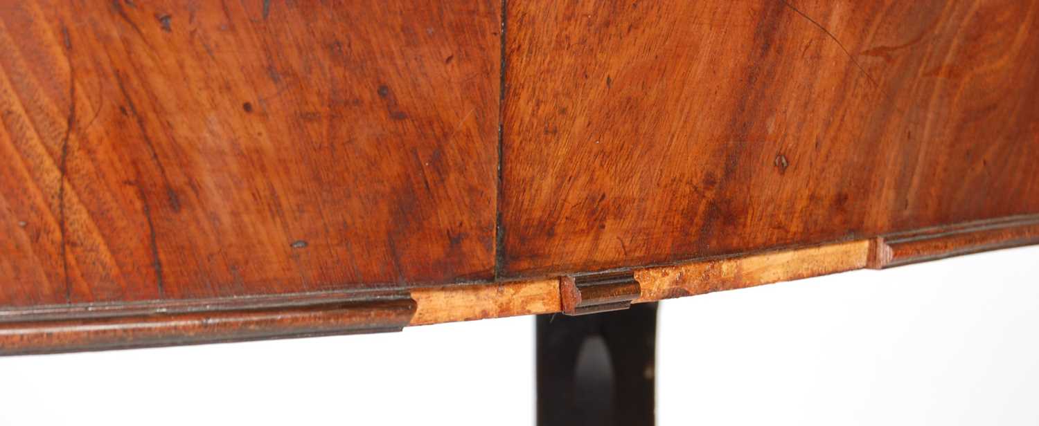 A George III mahogany serpentine card table, the shaped top with moulded edge opening to a green - Image 6 of 12