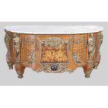 A late 19th/ early 20th century French marquetry and ormolu mounted commode after the original