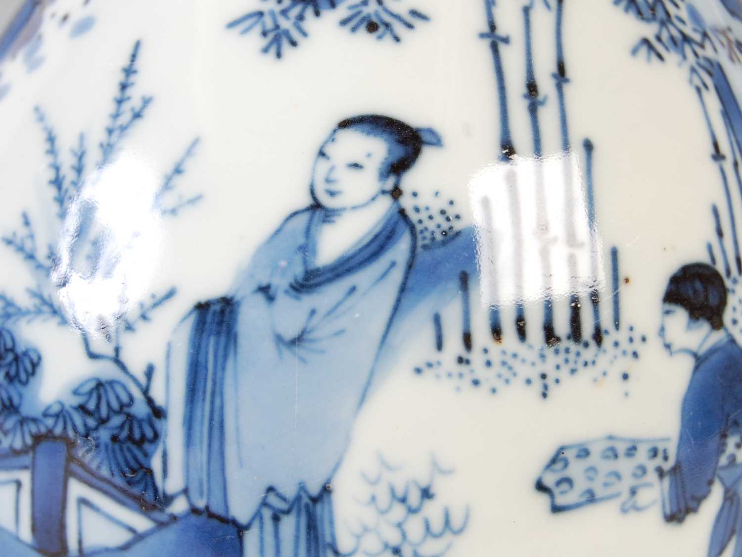A Chinese porcelain blue and white jug, Qing Dynasty, decorated with three figures in a fenced - Image 8 of 10