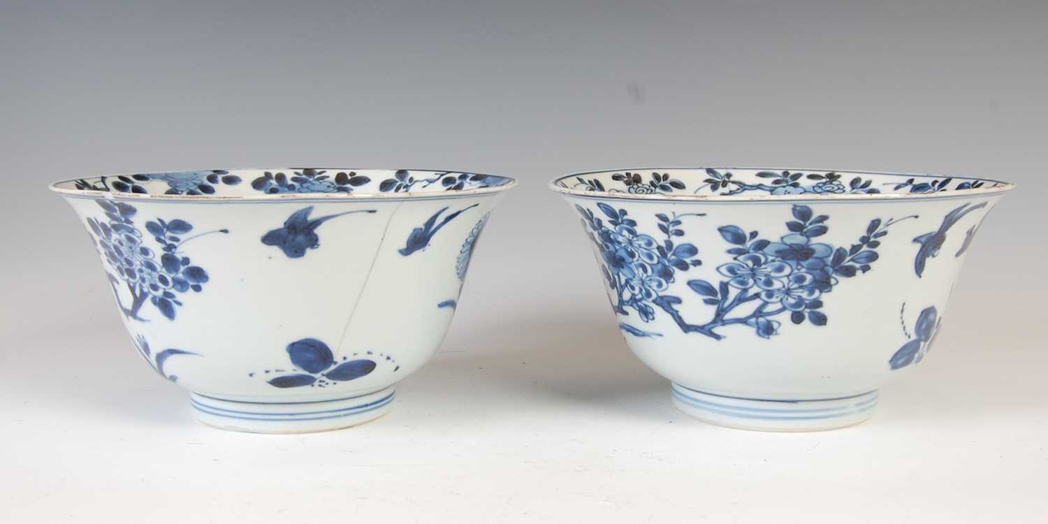 A pair of Chinese porcelain blue and white bowls, Qing Dynasty, the exteriors decorated with - Image 3 of 16