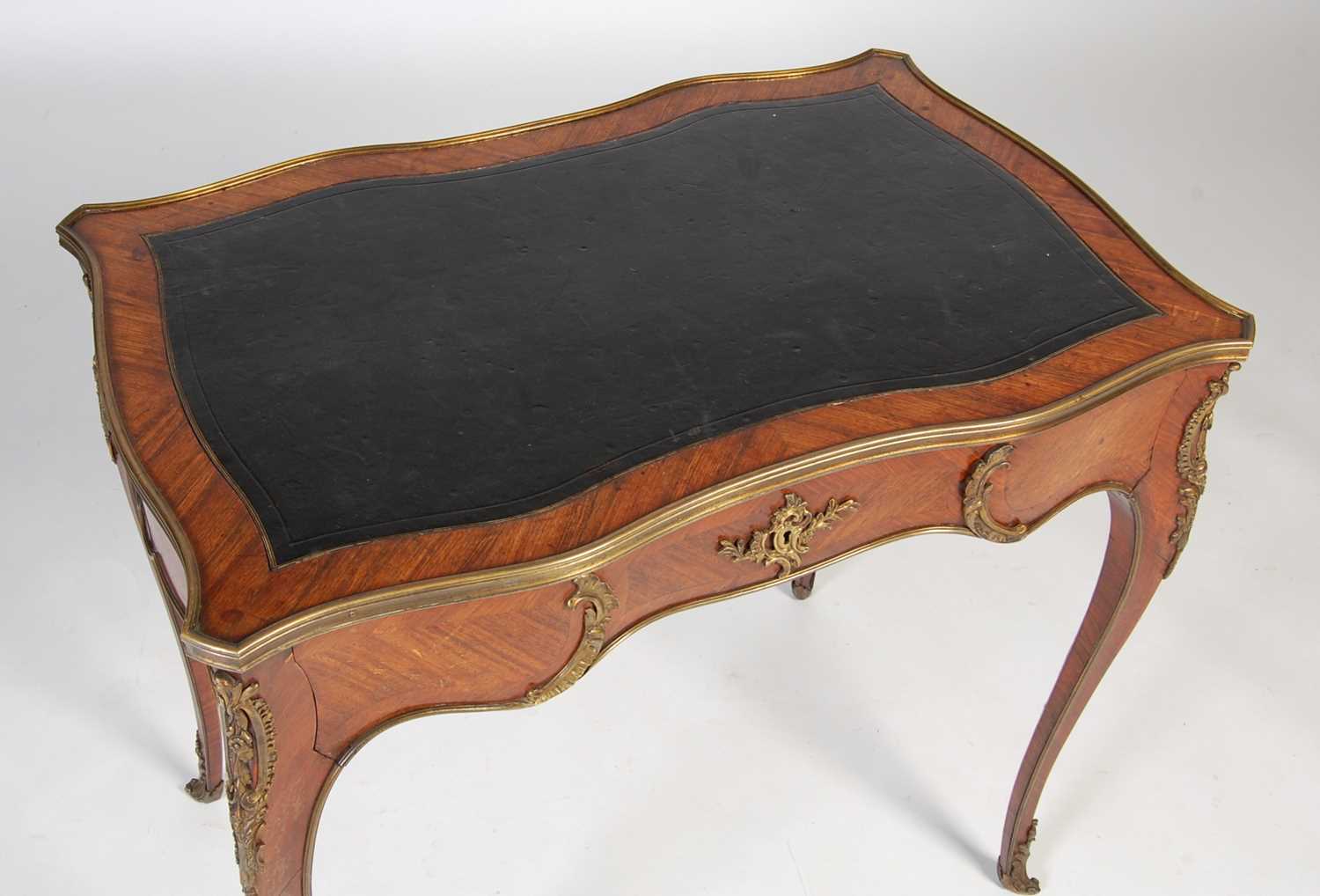 A late 19th/ early 20th century rosewood and gilt metal mounted writing table, the rectangular top - Image 6 of 12