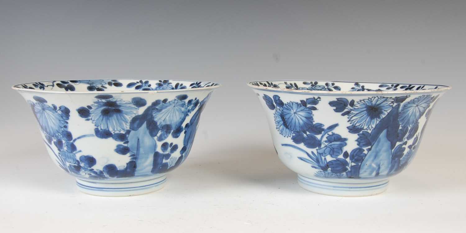 A pair of Chinese porcelain blue and white bowls, Qing Dynasty, the exteriors decorated with - Image 4 of 16