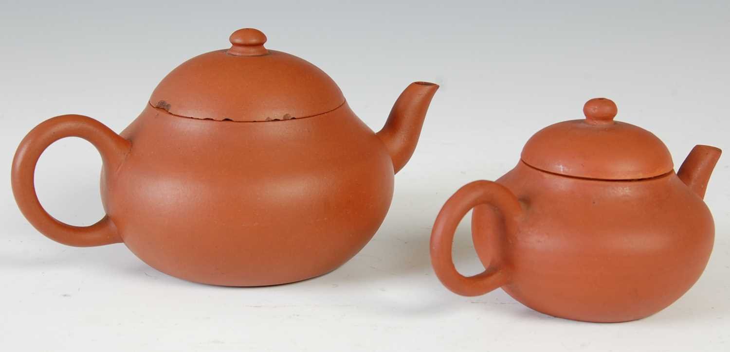 Three Chinese Yixing tea pots and covers, the largest decorated in relief with pine trees and - Image 10 of 14