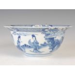 A Chinese porcelain blue and white bowl, Qing Dynasty, the exterior decorated with ladies and boys