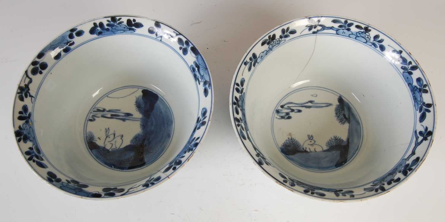 A pair of Chinese porcelain blue and white bowls, Qing Dynasty, the exteriors decorated with - Image 6 of 16