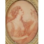 After Angelica Kauffman A classical maiden and bird, charcoal and chalk, framed oval, in giltwood