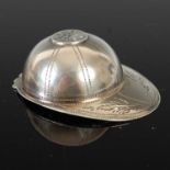 A Victorian silver novelty caddy spoon in the form a jockey's cap, Birmingham, 1888, makers mark