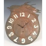 A Glasgow School Arts & Crafts patinated copper wall clock in the manner of Peter Wylie Davidson,