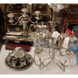 A group of mixed metal ware comprising an Epergne, markers marks W & G S, two EPNS five bar toast