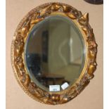 A mid 20th century gilt framed oval bevelled wall mirror, 37.5cm x 33.5cm