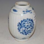 A Chinese blue and white porcelain jar, Qing Dynasty, of fluted oval form decorated with roundels of