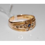 A late 19th century 15ct gold, sapphire and split pearl ring, gross weight 4.4 grams (one split