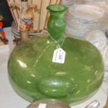 A green art glass vase