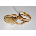 Three assorted 18ct gold rings, gross weight 12.8 grams.