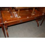 A reproduction coffee table with single frieze drawer.