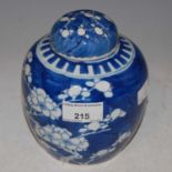 A Chinese porcelain blue and white jar and cover, late Qing Dynasty, decorated with prunus blossom