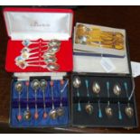 A cased set of six Norwegian silver and enamel coffee spoons, together with a cased set of six