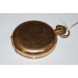 A vintage 9ct gold cased hunter cased pocket watch by 'Waltham, USA' with black and white Roman