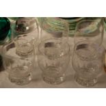 Six glass tumblers with facet cut detail