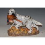 A Royal Doulton figure of a spaniel retrieving pheasant HN3529.