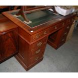 A late 19th / early 20th century mahogany pedestal desk
