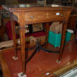 An Edwardian rosewood and marquetry inlaid writing desk with hinged top opening to a fitted interior