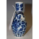 A Chinese blue and white porcelain miniature vase, Qing Dynasty, the shoulder set with chilong, 12cm