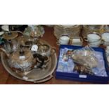 An electroplated four piece tea set together with EP twin handled tray and remaining EP wares