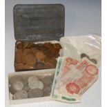 A collection of assorted coinage and banknotes to include 'Bank of England' one pound note, two '