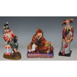 Three Royal Doulton figures to include 'The Potter' HN1493, 'Drummer Boy' HN2679, and 'The Jester'