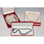 'Camrose & Kross', a cased double strand pearl necklace, 'Majorca' a cased single strand pearl