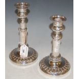 A pair of late 19th / early 20th century Sheffield plate telescopic candlesticks