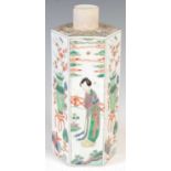 A Chinese porcelain famille verte hexagonal tea canister and cover, decorated with rectangular