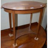 A group of occasional furniture comprising a mahogany circular snap-top occasional table, a neat