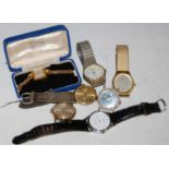 A collection of seven assorted vintage wristwatches.