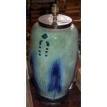 An Art Nouveau style blue and green glazed jar mounted as a table lamp