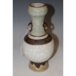A Chinese porcelain crackle glazed bottle vase, Qing Dynasty (damages), 25cm high