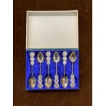 A box of six Chinese silver teaspoons.