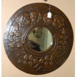 Marion Henderson Wilson (1869-1956) A Glasgow School copper wall mirror, dated 1908, the circular