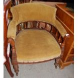 A 19th century tub chair with green corded upholstery