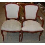 A French boudoir chair together with another similar chair