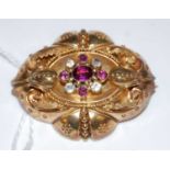 A Victorian yellow metal amethyst and white sapphire set oval brooch, gross weight 9.9 grams.