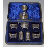 A Sheffield silver six-piece cruet set in fitted case, together with a Birmingham silver