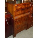 A flame mahogany chest of drawers formed from an ogee type chest